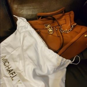 Authentic MK Luggage style purse